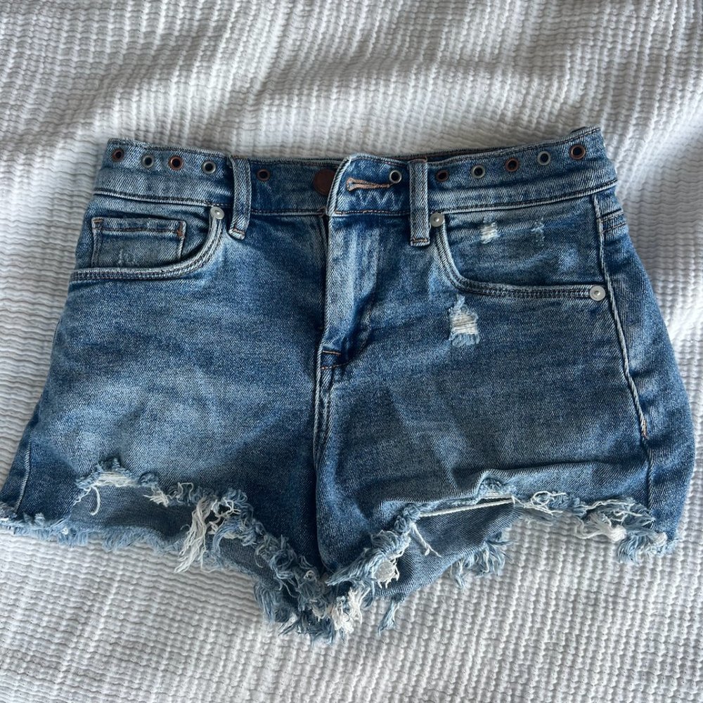 Blank NYC high rise jean shorts with adorable design on the top of shorts.